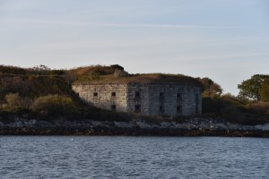 a castle surrounded by a body of water